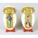 A PAIR OF ART DECO CONTINENTAL PORCELAIN VASES painted with a full length portrait of a nobleman and