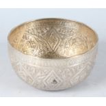 AN INDIAN SILVER CIRCULAR BOWL. 6ins diameter.