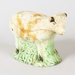 A STAFFORDSHIRE POTTERY RAM, possibly Wheildon. 4.75ins long.