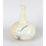 A JAPANESE GREY AND BLUE SPECKLED BULBOUS VASE. 7ins high.