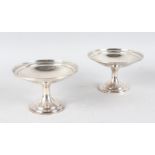 A PAIR OF STERLING SILVER TAZZAS. 5.5 diameter.