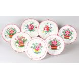 SEVEN FRENCH FLOWER DECORATED PLATES. 9ins diameter.