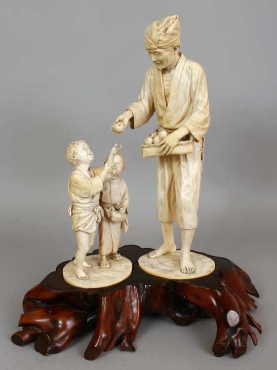 A LARGE UNUSUAL FINE QUALITY SIGNED JAPANESE MEIJI PERIOD IVORY DOUBLE OKIMONO GROUP, comprising two