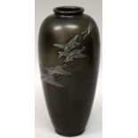 A GOOD QUALITY SIGNED JAPANESE MEIJI PERIOD SILVER ONLAID PATINATED BRONZE VASE, the sides inscribed