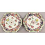 A GOOD PAIR OF CHINESE YONGZHENG/QIANLONG PERIOD FAMILLE ROSE PORCELAIN HEXAFOIL PORCELAIN DISHES,