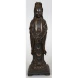 A FINE QUALITY CHINESE QING DYNASTY SHISOU BRONZE FIGURE OF GUANYIN, standing on a rectangular