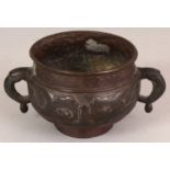 A SMALL 19TH/20TH CENTURY BRONZE CENSER, weighing 285gm, the sides cast with archaic taotie masks,