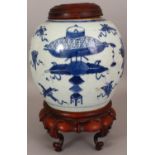AN 18TH/19TH CENTURY CHINESE PROVINCIAL BLUE & WHITE PORCELAIN JAR, together with a fitted
