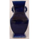 A GOOD 18TH/19TH CENTURY CHINESE BLUE GLAZED PORCELAIN VASE, of rectangular section, applied with