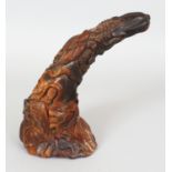 AN UNUSUAL CHINESE HORN CARVING, carved in the form of a rhinoceros horn, 8.75in high.