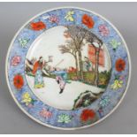AN EARLY 20TH CENTURY CHINESE FAMILLE ROSE PORCELAIN PLATE, painted to its centre with figures in