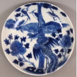 A SMALL GOOD QUALITY 19TH CENTURY CHINESE BLUE & WHITE PORCELAIN PHOENIX SAUCER DISH, together