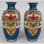 A PAIR OF JAPANESE MEIJI PERIOD BLUE GROUND CLOISONNE VASES, each decorated with dependant lappet