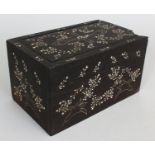 AN EASTERN BONE INLAID HEAVY HARDWOOD RECTANGULAR BOX, with sliding cover, decorated with meandering