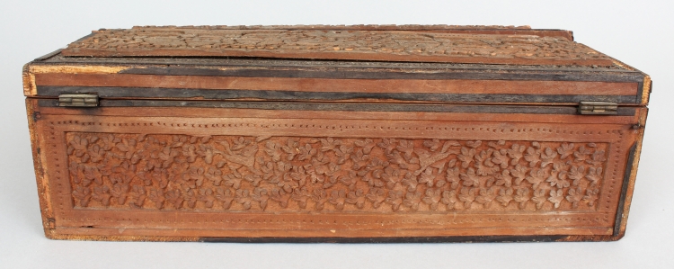 A 19TH CENTURY INDIAN CARVED SANDALWOOD WRITING BOX, with folding slope and lidded compartment, 13. - Image 5 of 6