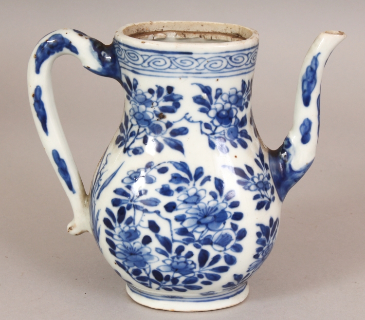 A CHINESE KANGXI PERIOD BLUE & WHITE PORCELAIN EWER, painted in a good tone of underglaze-blue