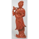 A 20TH CENTURY CHINESE HARDSTONE CARVING OF A STANDING LADY, together with a fitted box, the lady