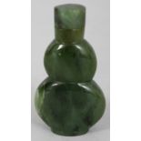 A CHINESE SPINACH GREEN JADE DOUBLE GOURD SNUFF BOTTLE & STOPPER, 2.4in high.