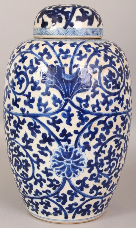 A 19TH CENTURY CHINESE BLUE & WHITE CRACKLEGLAZE PORCELAIN JAR & COVER, painted with an overall