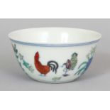 A CHINESE DOUCAI PORCELAIN CHICKEN CUP, the base with a six-character Chenghua mark, 3.2in