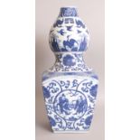 A LARGE CHINESE SQUARE SECTION BLUE & WHITE PORCELAIN VASE, with a circular section gourd form neck,