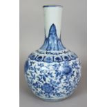 A CHINESE YONGZHENG PERIOD BLUE & WHITE PORCELAIN BOTTLE VASE, circa 1730, the sides painted with