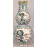 A 19TH CENTURY CHINESE PINK GROUND FAMILLE ROSE DOUBLE GOURD PORCELAIN VASE, the sides painted