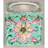 A CHINESE TONGZHI MARK & PERIOD TURQUOISE GROUND FAMILLE ROSE PORCELAIN WATER POT, the sides of