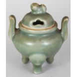 A SMALL ORIENTAL CELADON PORCELAIN TRIPOD CENSER & COVER, 3.5in wide including handles & 4.2in