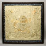 AN UNUSUAL 19TH/20TH CENTURY FRAMED CHINESE CREAM GROUND SILK EMBROIDERY, decorated in satin