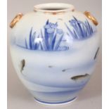 AN EARLY/MID 20TH CENTURY JAPANESE FUKAGAWA PORCELAIN VASE, painted with carp swimming before