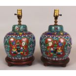 A PAIR OF 20TH CENTURY CHINESE CLOISONNE JARS & COVERS, fitted for electricity, each decorated