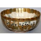 A SIGNED JAPANESE MEIJI PERIOD SATSUMA FLUTED EARTHENWARE BOWL, painted with various panels of