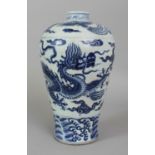 A CHINESE YUAN STYLE BLUE & WHITE MEIPING PORCELAIN VASE, the sides decorated with a dragon above