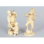 A SIGNED JAPANESE MEIJI PERIOD IVORY OKIMONO OF A MAN & HIS SON, the base with an engraved signature