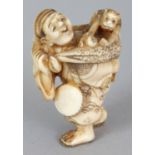 A SMALLER SIGNED JAPANESE MEIJI PERIOD IVORY NETSUKE OF A MONKEY PERFORMER, the walking man