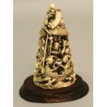 A FINE QUALITY SIGNED JAPANESE MEIJI PERIOD IVORY OKIMONO OF THE SEVEN LUCKY GODS, together with a