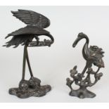 TWO JAPANESE MEIJI PERIOD BRONZE MODELS OF STORKS, one with a maker's mark to its base, 9.5in & 7.