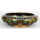 A LARGE EARLY 20TH CENTURY CHINESE CLOISONNE BOWL, of shallow form, decorated with formal
