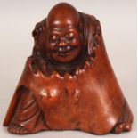 A GOOD QUALITY 19TH CENTURY CHINESE CARVED ROOTWOOD FIGURE OF A SEATED CLOAKED SAGE, the wood with a