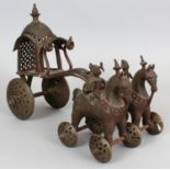 A 19TH CENTURY INDIAN SECTIONAL BRONZE MODEL OF A CHARIOT, on moveable wheels, the canopied