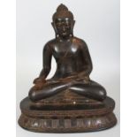 A 19TH/20TH CENTURY BURMESE BRONZE FIGURE OF BUDDHA, seated in dhyanasana on a double lotus