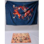 A 20TH CENTURY CHINESE BLUE GROUND EMBROIDERED SILK PANEL, decorated in vivid red, orange and