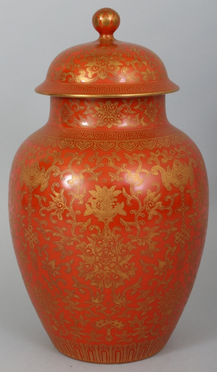 A GOOD QUALITY CHINESE CORAL GROUND PORCELAIN VASE & COVER, the sides decorated with formal - Image 3 of 10