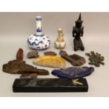 A QUANTITY OF SUNDRY ORIENTAL ITEMS, including tile fragments, a Thai wood deity, two Chinese vases,