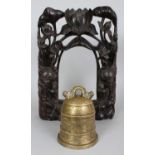 AN EARLY 20TH CENTURY CHINESE BRONZE BELL, with engraved decoration, together with an elaborate