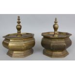A PAIR OF EARLY 20TH CENTURY CHINESE BRONZE HEXAGONAL JARS & COVERS, each with engraved