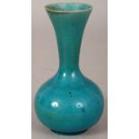 ANOTHER 19TH/20TH CENTURY CHINESE TURQUOISE GLAZED PORCELAIN VASE, the bulbous body rising to a