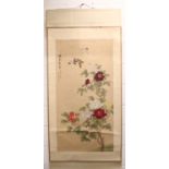 A LARGE CHINESE HANGING SCROLL PAINTING ON SILK, decorated with birds in flight above peony, and