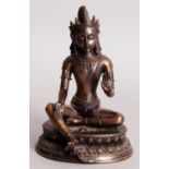 A CHINESE BRONZE LIKE FIGURE OF TARA, seated on a double lotus plinth, 5.25in high.